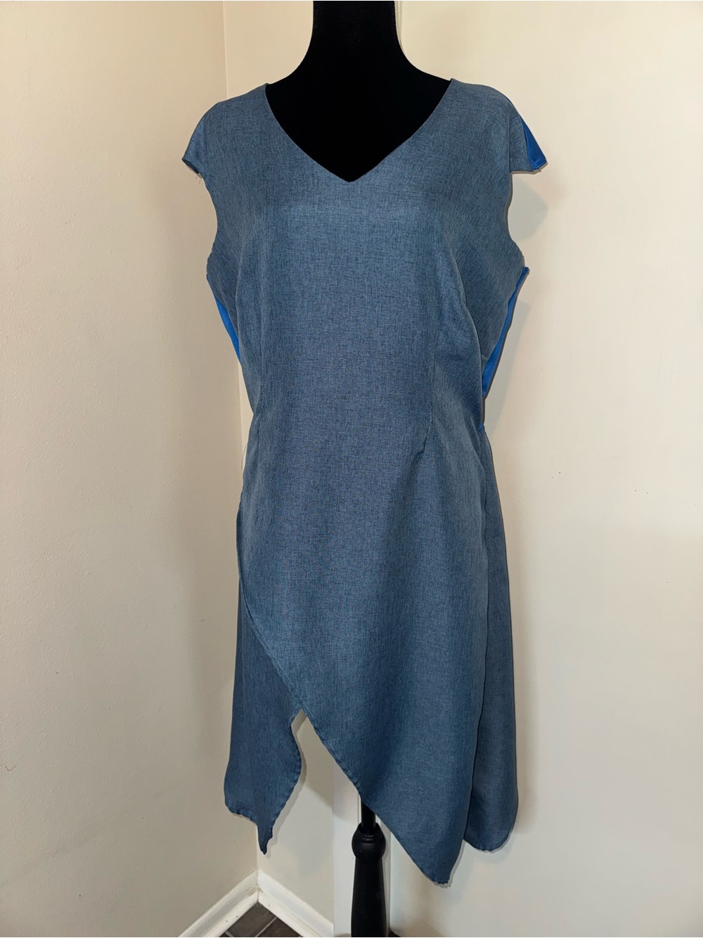 Sleeveless Blue V-Neck Tunic with Asymmetrical Hem